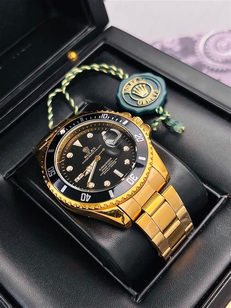 rolex submariner dorado y negro|Rolex Submariner watch review.